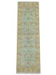 Amritsari floral runner handknotted wool carpet with sky blue base and golden motifs – luxury oriental rug