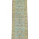 Amritsari floral runner handknotted wool carpet with sky blue base and golden motifs – luxury oriental rug