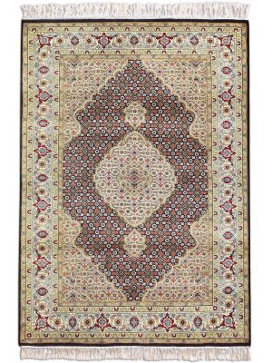 Handknotted wool oriental carpet with grid design, central motif, and black, gold, red border – luxury rug