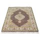 Handknotted wool oriental carpet with grid design, central motif, and black, gold, red border – luxury rug
