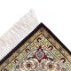 Handknotted wool oriental carpet with grid design, central motif, and black, gold, red border – luxury rug