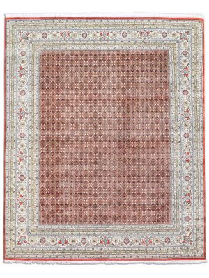 Hand knotted wool carpet with rust base, geometric patterned background, and floral border – luxury oriental rug