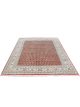 Hand knotted wool carpet with rust base, geometric patterned background, and floral border – luxury oriental rug