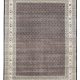 Ebon Garden hand knotted wool carpet with black base, geometric patterned background, and floral border – luxury oriental rug