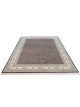 4890-02 Ebon Garden hand knotted wool carpet with black base, geometric patterned background, and floral border – luxury oriental rug