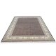Ebon Garden hand knotted wool carpet with black base, geometric patterned background, and floral border – luxury oriental rug