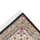 Ebon Garden hand knotted wool carpet with black base, geometric patterned background, and floral border – luxury oriental rug