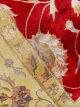 Handknotted wool oriental carpet with golden leaves on red background – luxury regal rug
