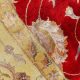 Handknotted wool oriental carpet with golden leaves on red background – luxury regal rug