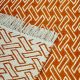 Zenga Orange handwoven flatweave dhurrie with modern rectangular design in rich orange tones by Den Decor India