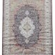 Shalimar hand-knotted viscose rug with Oriental medallion, floral vines, and paisley border in navy, ivory, gold, and terracotta tones