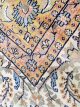 Shalimar hand-knotted viscose rug with Oriental medallion, floral vines, and paisley border in navy, ivory, gold, and terracotta tones