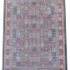 Regal Mosaic hand-knotted wool rug with deep red, blue, green, and rust tones in geometric mosaic design with black outlines