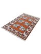 _DSC0572 Elephant Court hand-knotted wool rug with elephant motifs and Kashmiri-inspired borders in warm brown and peach tones