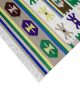 Flatwoven dhurrie with hexagon and link motifs in olive, yellow, and purple – geometric artisanal rug