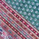 Handknotted emerald green wool carpet with red border and paisley motifs – luxury oriental rug