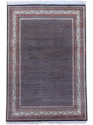 Handknotted black wool carpet with rust boteh motifs – luxury oriental rug