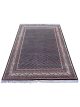 Handknotted black wool carpet with rust boteh motifs – luxury oriental rug