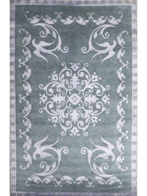 Mint white carpet with central motif and detailed border Meadow Song