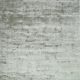 Handloom grey carpet with silver tonal variations and textured finish by Den Decor India