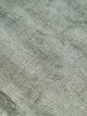 Handloom grey carpet with silver tonal variations and textured finish by Den Decor India